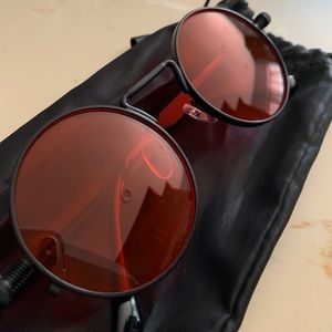 Sunglasses with red lenses
